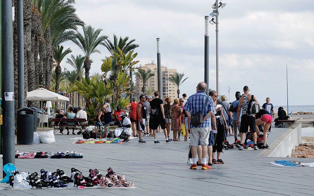 Illegal traders move off beaches into the towns