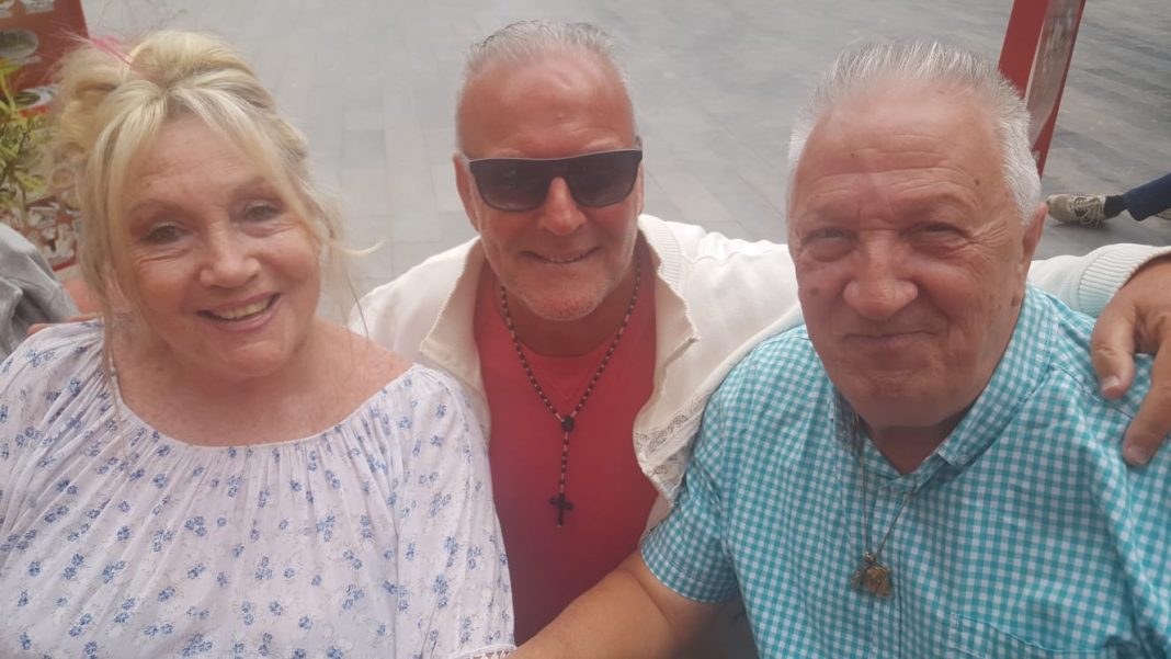 Norma and Esteban Fernandez with reporter Andrew Atkinson (centre) in Los Montesinos.